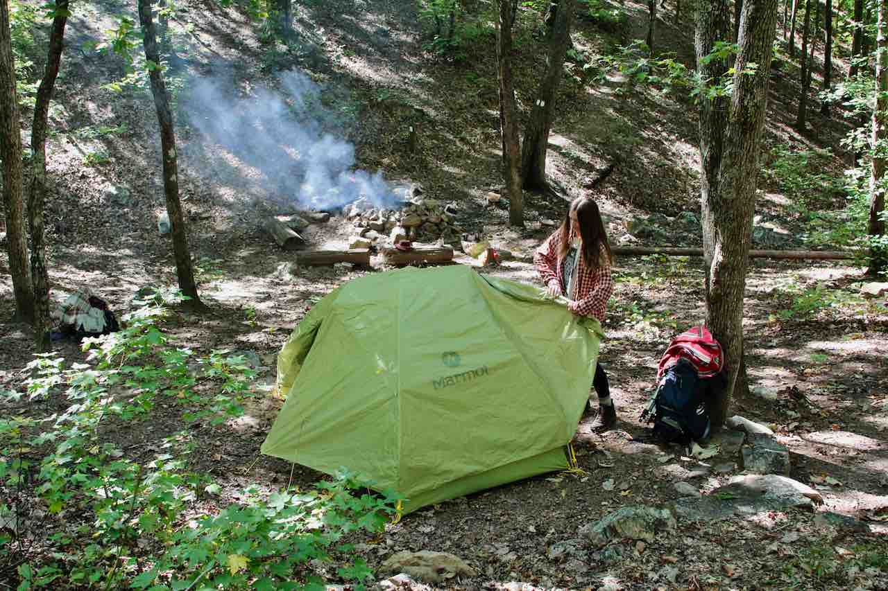 camping-woman-setting-tent-explore-harris-county